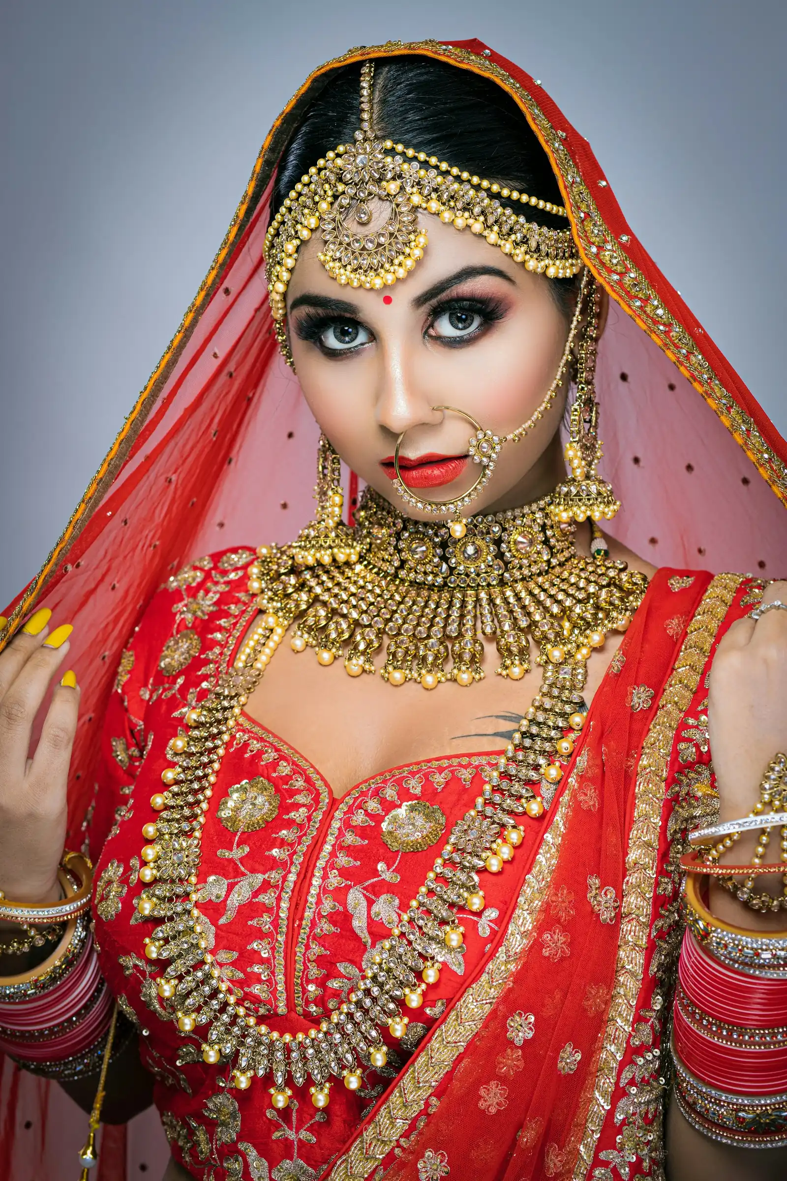 Bride in crimson and gold