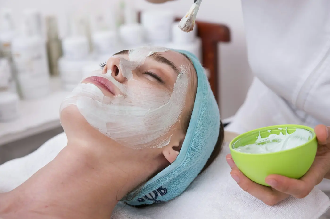Client relaxing during a professional facial